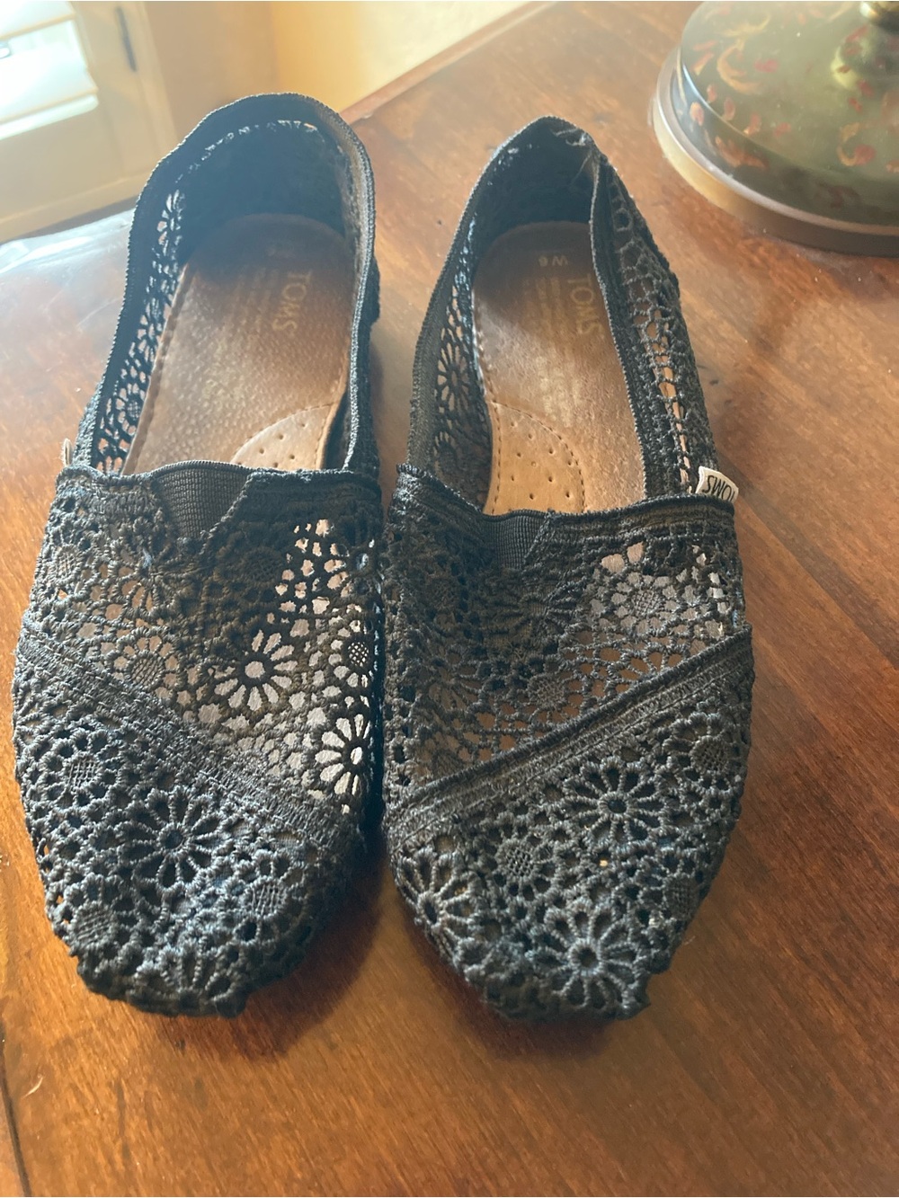 Toms Black Crochet Lace Slip-On Flats, size 6 used.